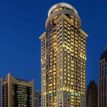 Dusit Hotel & Suites - Doha Eksteriør billede The hotel at night